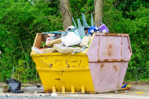 Dulwich Skip Hire vehicles and skips at a local site