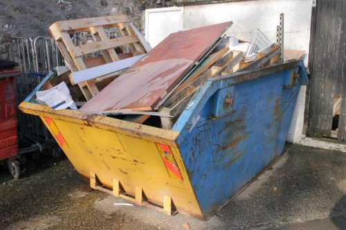 Dulwich Skip Hire vehicle and skip at a worksite