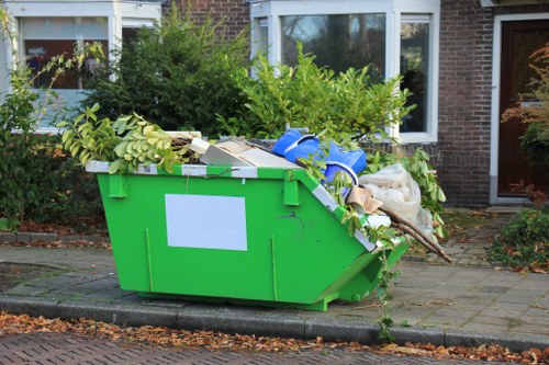 Large dumpster filled with demolition waste